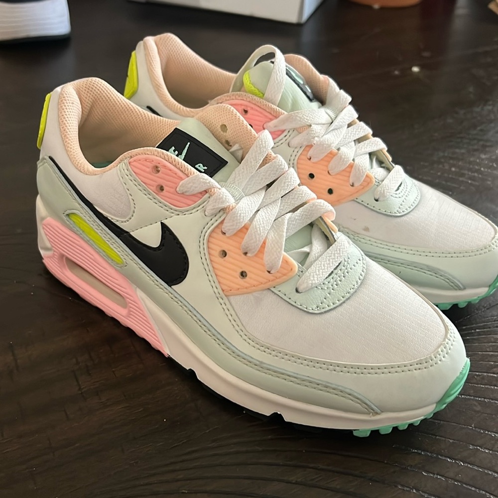 Almost like-new woman’s Nike Air. Small stain (shown in photo) only worn once.